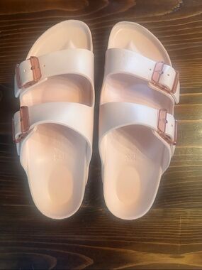 Birkenstock Two-Strap Slides in Pale Pink with Rose-Gold Buckles